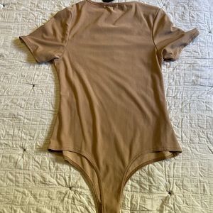 Pretty Little Thing, Stone Crepe Short Sleeve Thong Body suit. NEW! NEVER WORN.